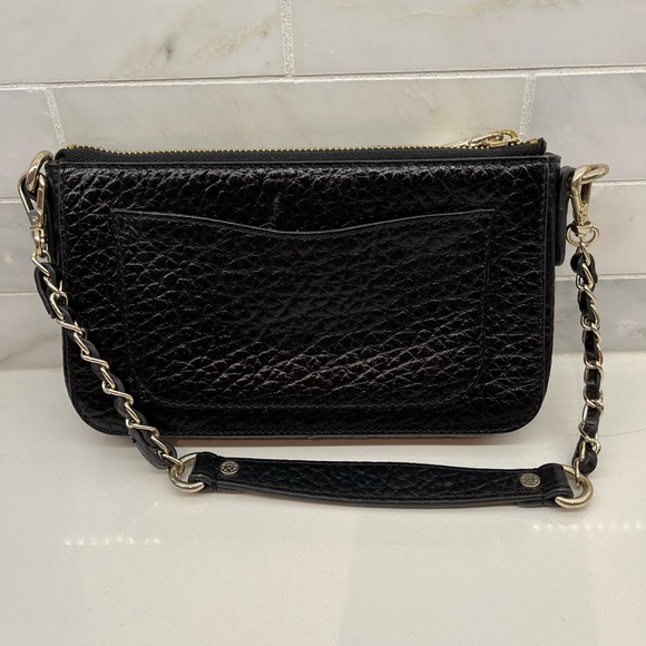 DKNY
Black crossbody plus gold chained single handle. - Picture 2 of 8